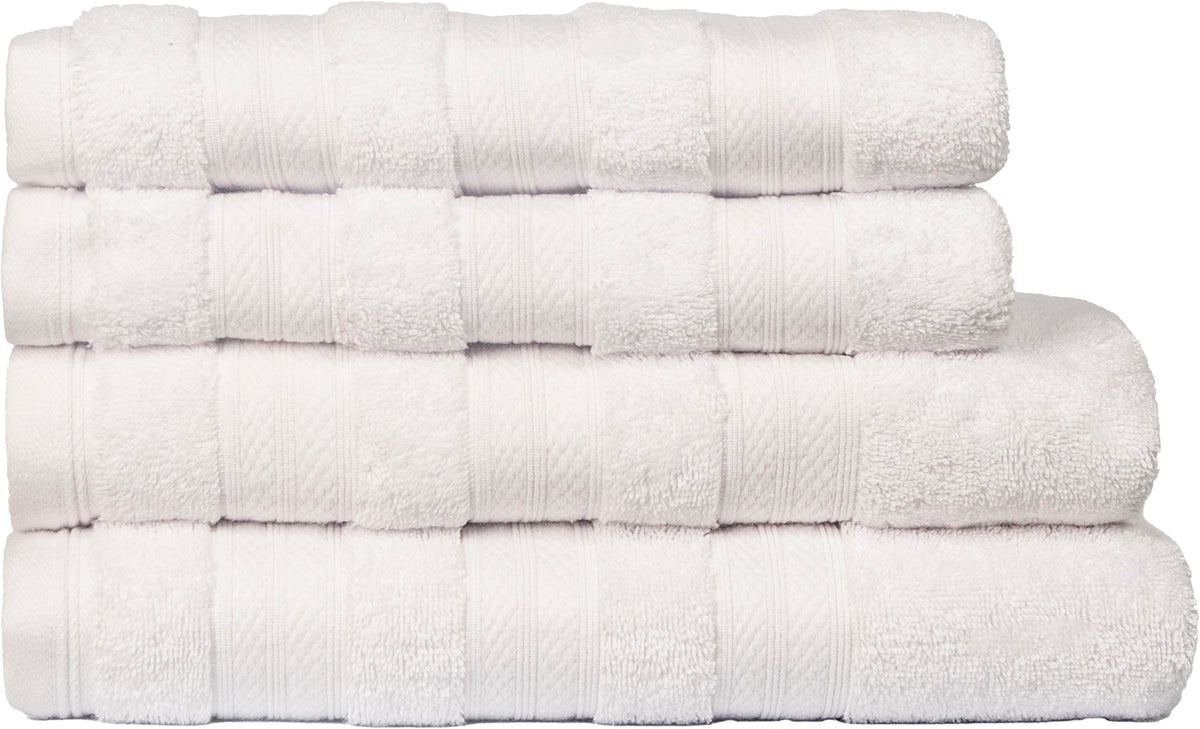White Melluva 4 piece towel set, folded and stacked